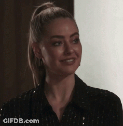 Blonde Ponytail Woman Smiling In Black Shirt GIF