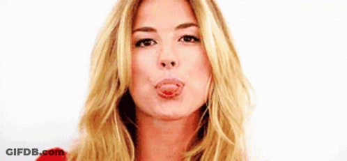 Blonde Woman Blowing Kiss With Tongue Out GIF