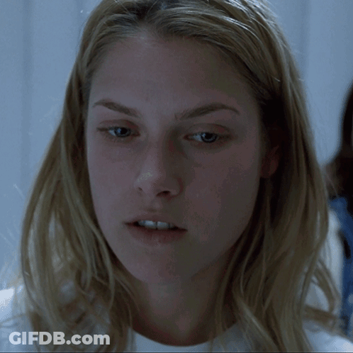 Blonde Woman Close Up In White Shirt GIF