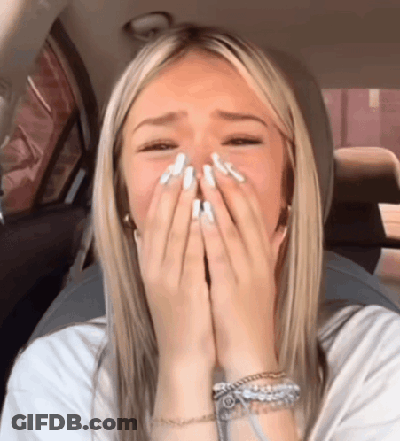 Blonde Woman Covering Face With Hands GIF