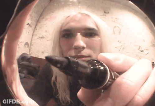 Blonde Woman Holding Ring GIF