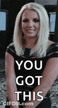 Blonde Woman In Black Dress Smiling Hands Together GIF