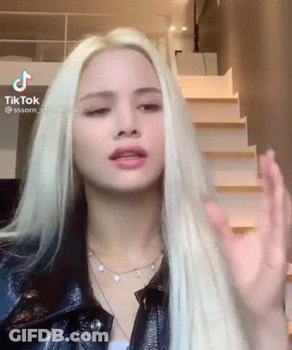 Blonde Woman In Black Leather Jacket GIF