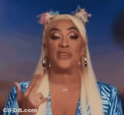 Blonde Woman In Blue Dress Giving Middle Finger GIF