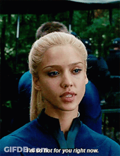 Blonde Woman In Blue Suit Says I'm So Hot For You Right Now GIF