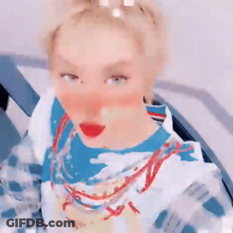 Blonde Woman In Blue White Shirt With Necklace GIF