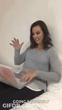 Blonde Woman In Green Tank Top Making Funny Face GIF