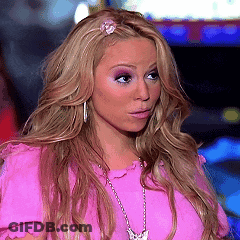 Blonde Woman In Pink Shirt And Necklace GIF