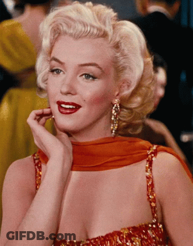 Blonde Woman In Red Dress With Red Lipstick GIF
