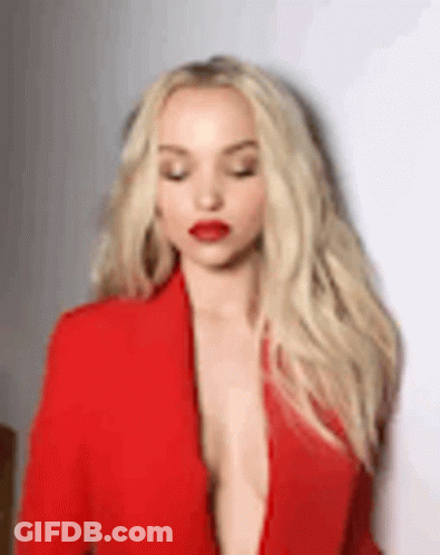 Blonde Woman In Red Jacket And Lipstick GIF