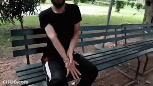 Blonde Woman In Red Lips Facing Crowd GIF