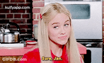 Blonde Woman In Red Shirt Talking To Man GIF