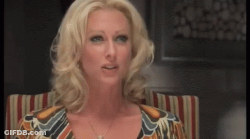 Blonde Woman In Striped Shirt And Necklace GIF