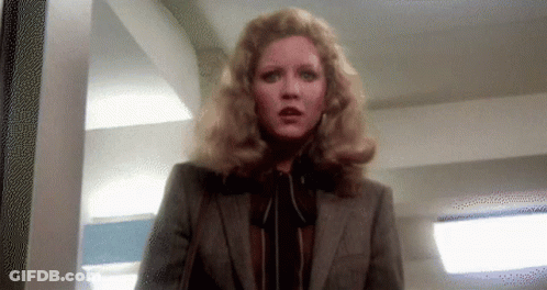 Blonde Woman In Suit GIF