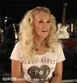 Blonde Woman In White Shirt Saying Good Girls Love GIF