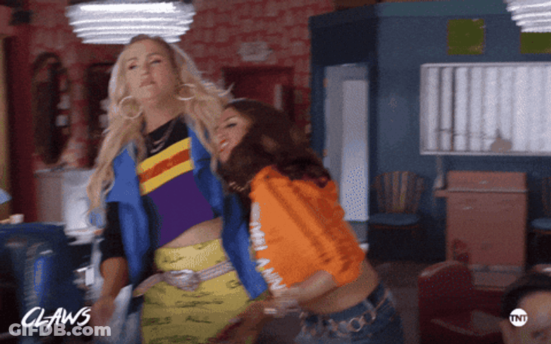 Blonde Woman Kicked Out Brunette Woman GIF
