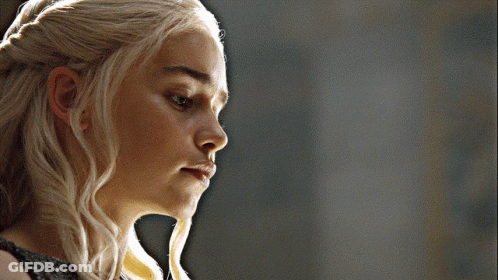 Blonde Woman Looking At Camera GIF