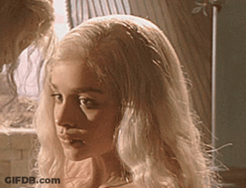 Blonde Woman Looking At Camera GIF