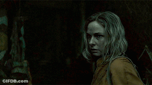 Blonde Woman Looking At Camera GIF