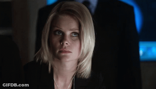 Blonde Woman Looking At Something GIF