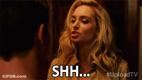Blonde Woman Making Shh Face GIF