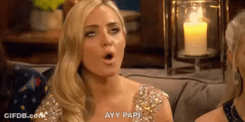 Blonde Woman On Couch Mouth Open Candle GIF