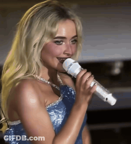 Blonde Woman Singing In Blue Dress GIF