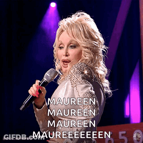 Blonde Woman Singing Maureen Maureen Maureen Into Microphone GIF