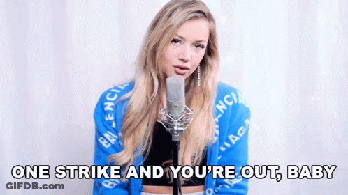 Blonde Woman Singing One Strike And You're Out Baby GIF