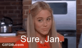 Blonde Woman Sitting In Kitchen Sure Jan GIF
