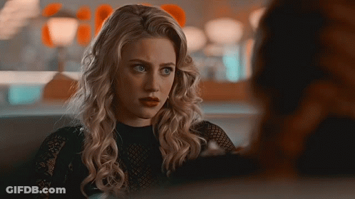 Blonde Woman Sitting With Another Woman GIF