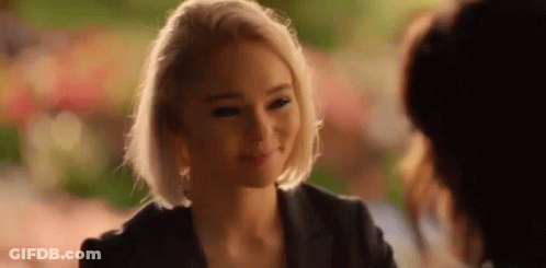 Blonde Woman Smiling At Another Woman GIF