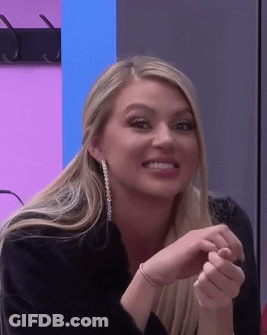Blonde Woman Smiling In Black Jacket GIF