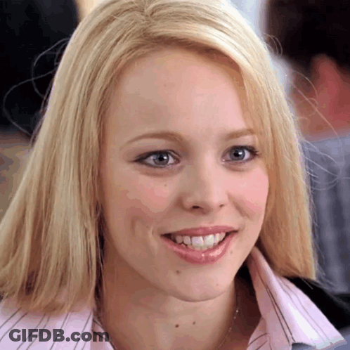 Blonde Woman Smiling In Pink Shirt GIF
