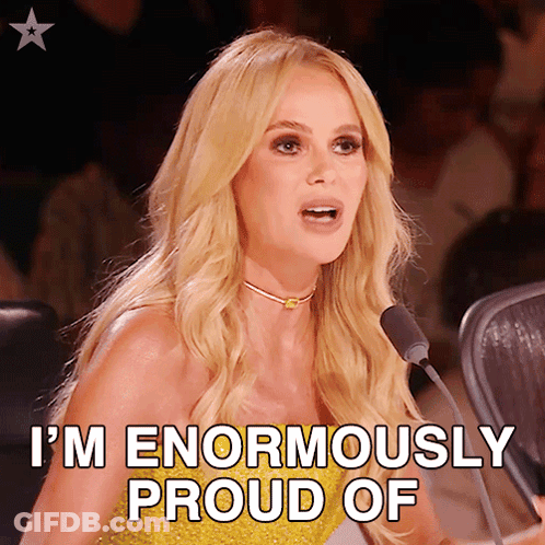 Blonde Woman Speaking Into Microphone I'm Enormously Proud Of GIF