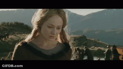 Blonde Woman Standing In Field GIF
