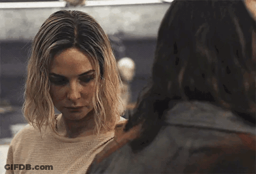 Blonde Woman Standing Next To Long-Haired Woman GIF