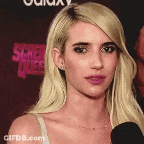 Blonde Woman Talking Into Microphone GIF