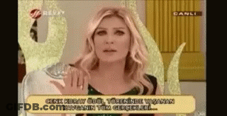 Blonde Woman Talking On TV Show GIF