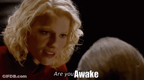 Blonde Woman Talking To Another Woman Are You Awake GIF