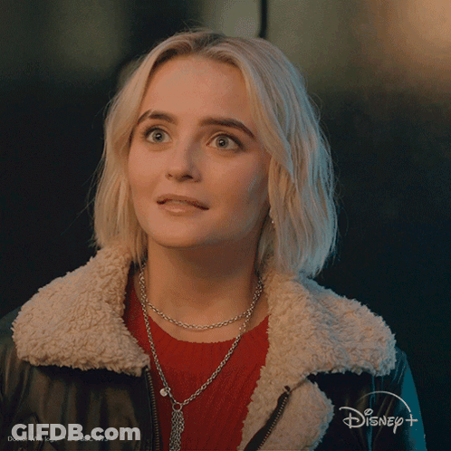 Blonde Woman Wearing Disney+ Ad GIF
