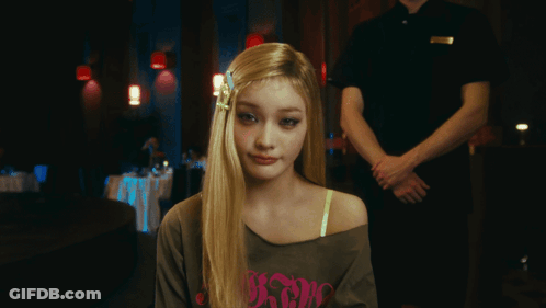 Blonde Woman Wearing Shirt Saying A GIF