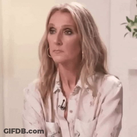 Blonde Woman White Shirt Earrings Making Funny Face GIF