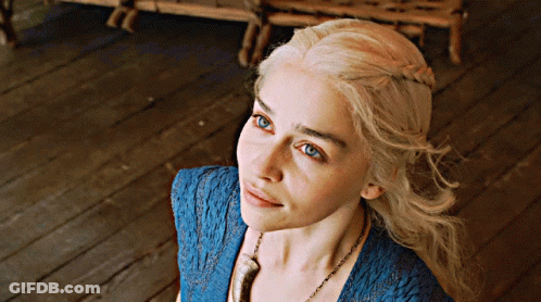 Blonde Woman With Blue Eyes In Blue Top GIF