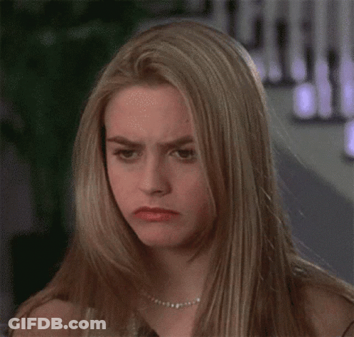 Blonde Woman With Pearl Necklace Making Funny Face GIF