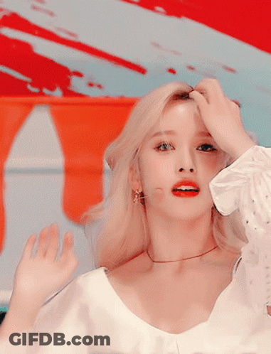 Blonde Woman With Red Lips White Shirt Earrings GIF