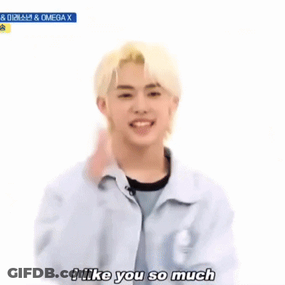 Blonde Young Man Making Heart With Hands GIF