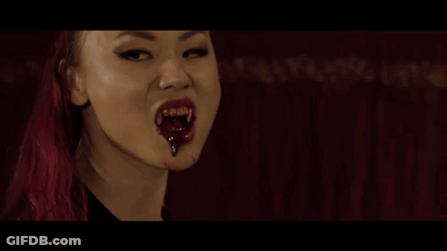 Blood Dripping Vampire Woman GIF