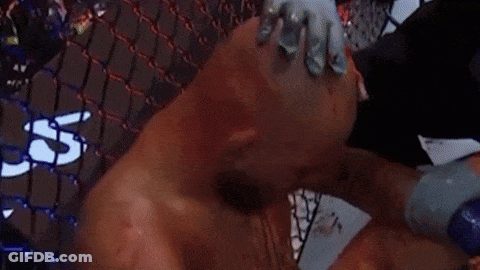 Bloodied Boxer Wiped With Towel In Ring GIF