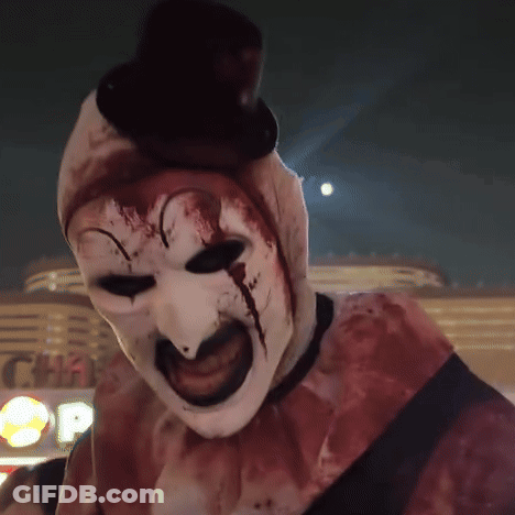 Bloody Clown With Top Hat In Front Of McDonald's Sign GIF